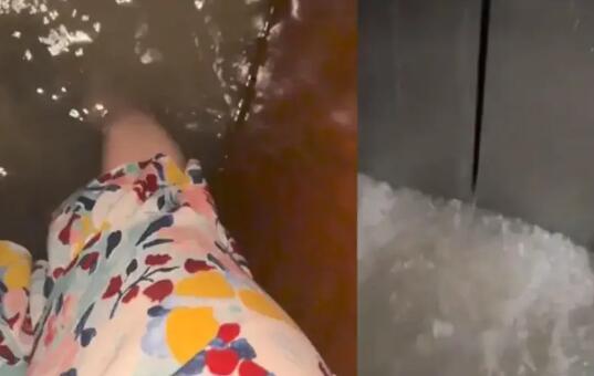 女子深夜乘電梯暴雨涌入被困1小時(shí) 到底是什么情況？